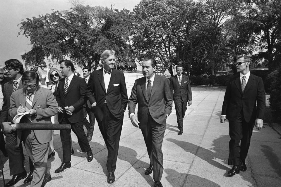 President Nixon, right, speak with Daniel Patrick Moynihan