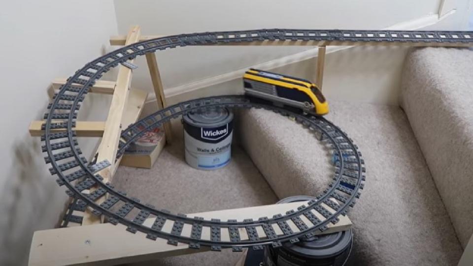 One man in the U.K. created a LEGO train set through his entire home.