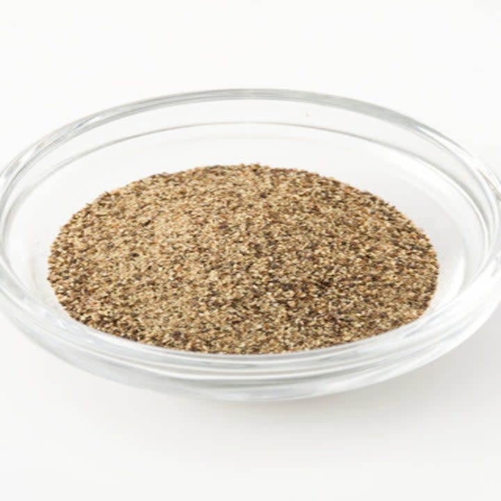 Finely ground black pepper in a bowl.