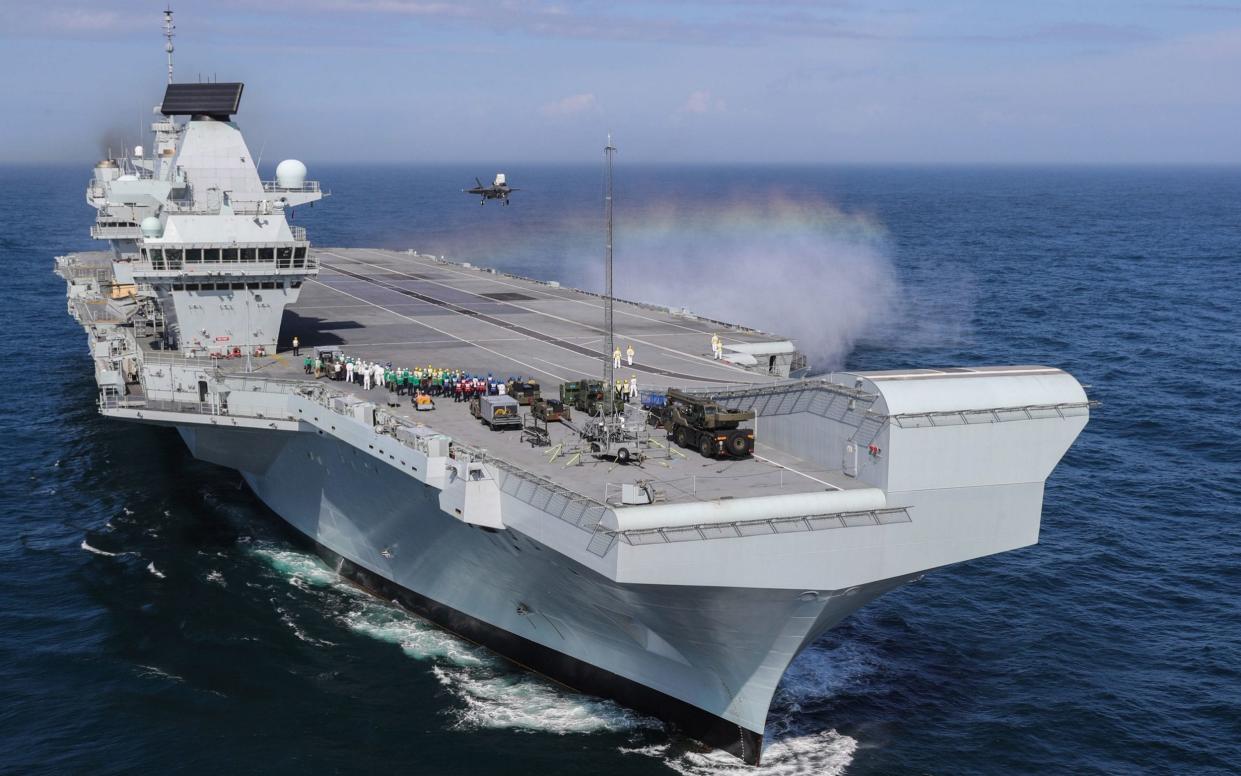 HMS Queen Elizabeth is the largest warship ever built in the UK weighing 65,000-tonnes, six shipyards around the UK have been involved in building various parts of the carrier -  PA