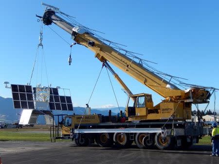 A crane operator adjusts a NASA super pressure balloon as it is prepared for launch from Wanaka Airport on New Zealand's South Island, March 29, 2016. Courtesy NASA/David Helfrich/Handout via REUTERS