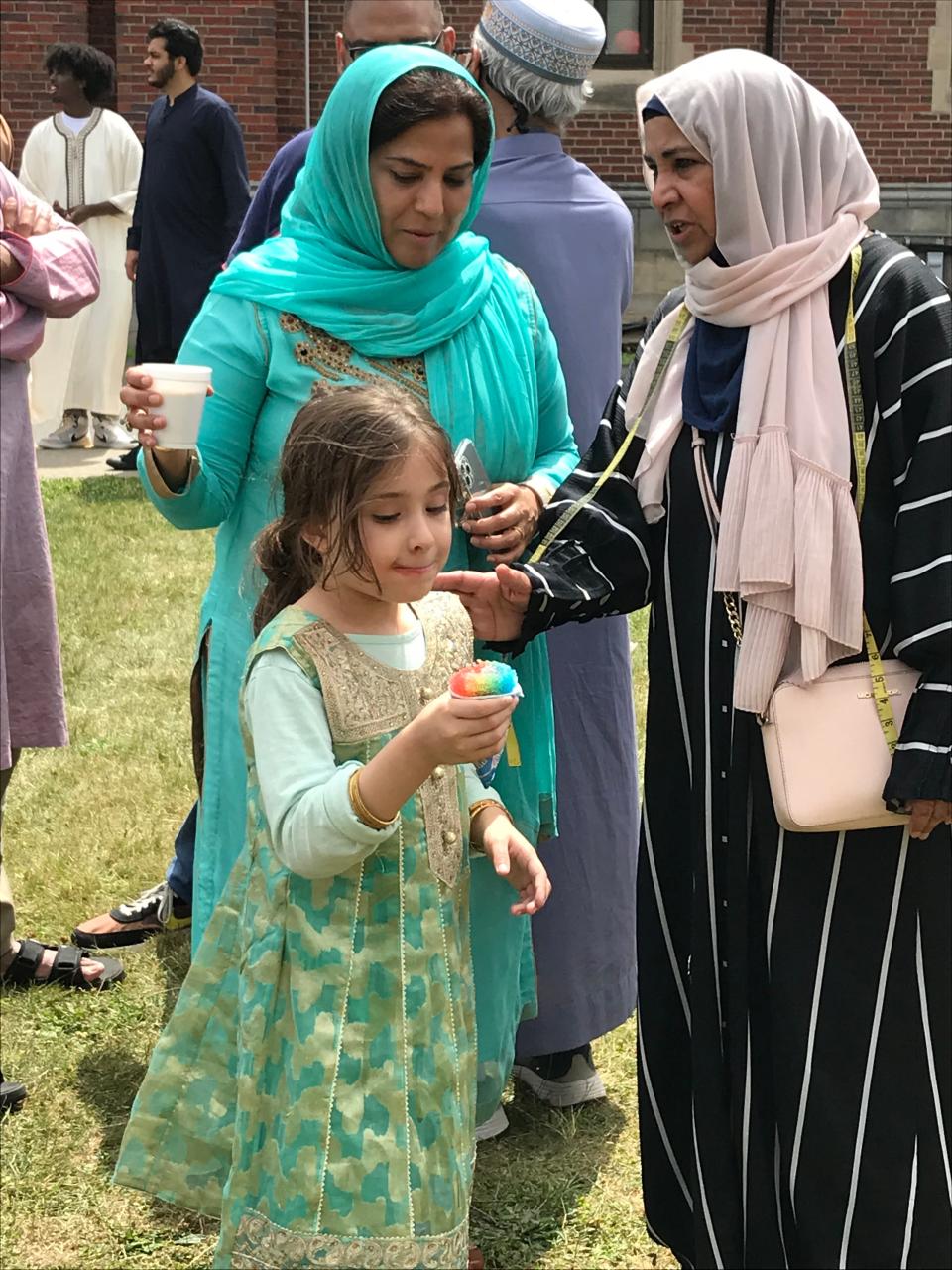 The Khan family from Edgewater enjoying the Eid Festival at the Teaneck Armory