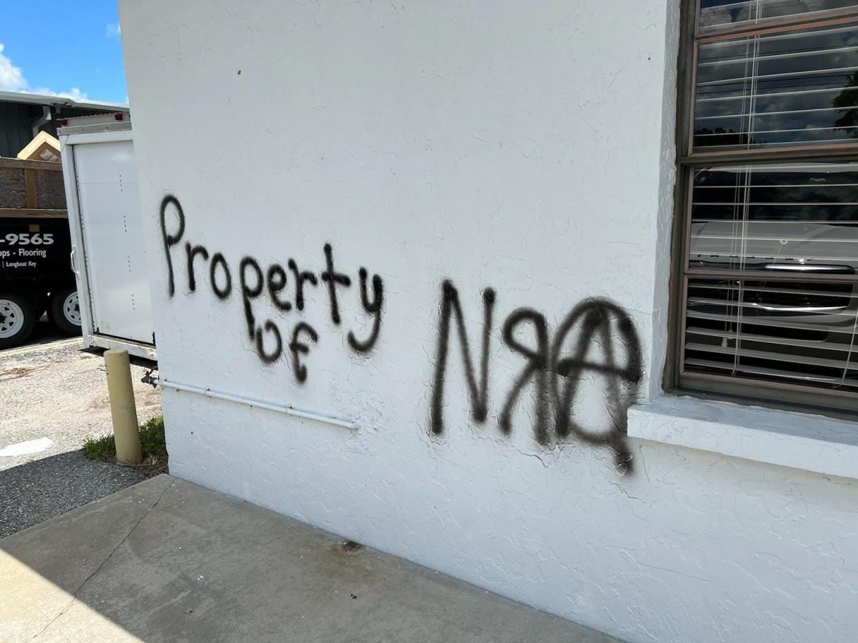 Late last month, the words "Property of NRA" were spray-painted on the building that houses the Republican Party of Sarasota County.