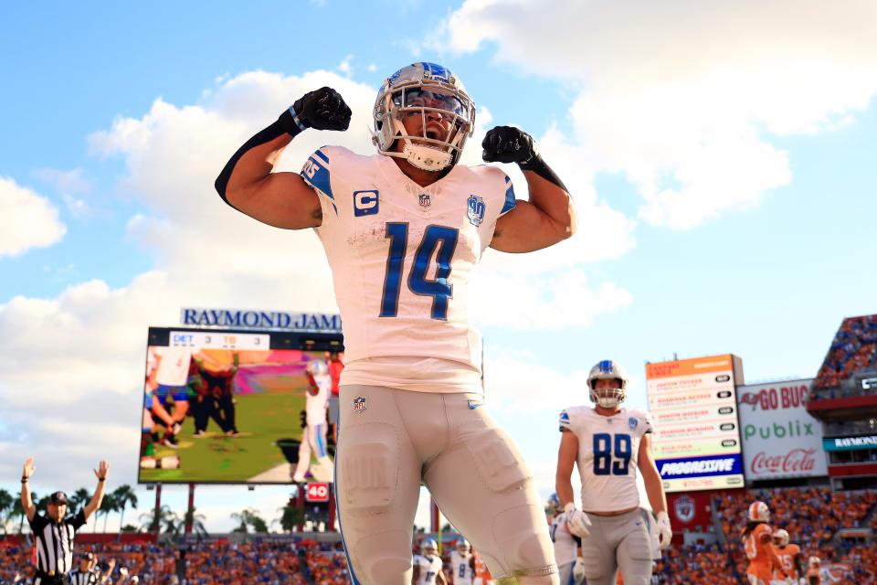 Amon-Ra St. Brown of the Detroit Lions celebrates after a receiving touchdown during the second quarter against the Tampa Bay Buccaneers at Raymond James Stadium in Tampa, Florida, on Sunday, Oct. 15, 2023.