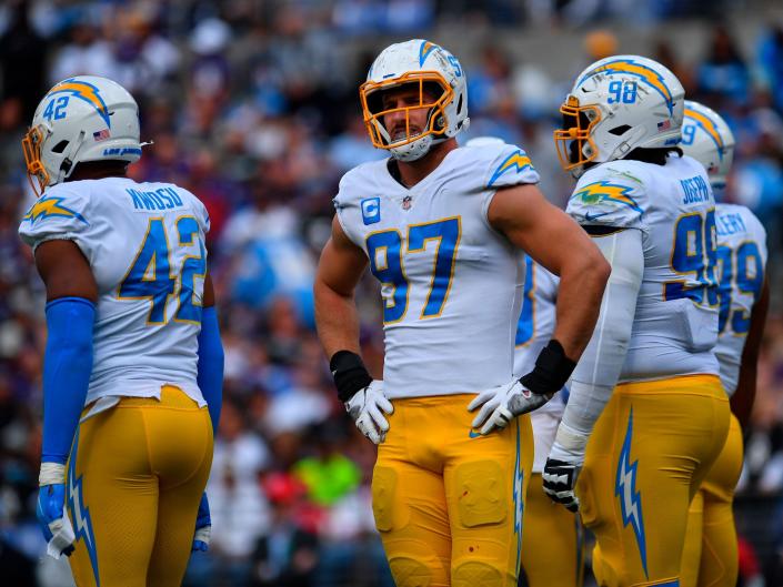 Joey Bosa waits for a play against the Baltimore Ravens.