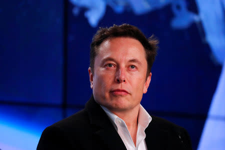 SpaceX founder Elon Musk looks on at a post-launch news conference after the SpaceX Falcon 9 rocket, carrying the Crew Dragon spacecraft, lifted off on an uncrewed test flight to the International Space Station from the Kennedy Space Center in Cape Canaveral, Florida, U.S., March 2, 2019. REUTERS/Mike Blake