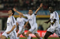 Reyes (L), Ivan Helguera (C) and Mali Mahamadou Diarra celebrate after scoring against Mallorca (JAIME REINA/AFP/Getty Images)