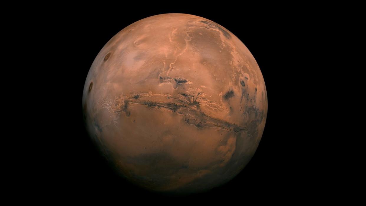  Mars seen against the blackness of space. 