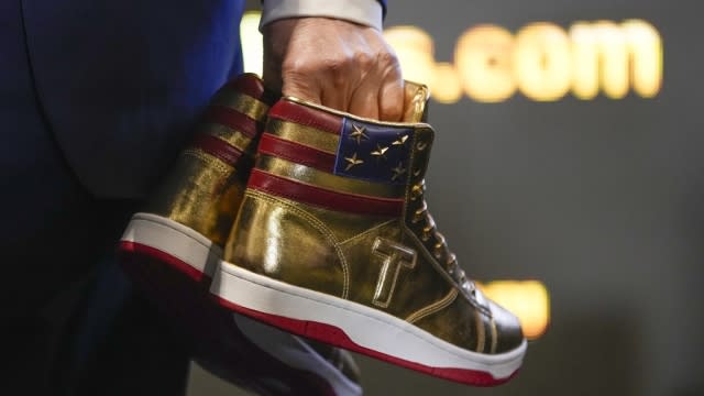 Donald Trump gold sneakers.