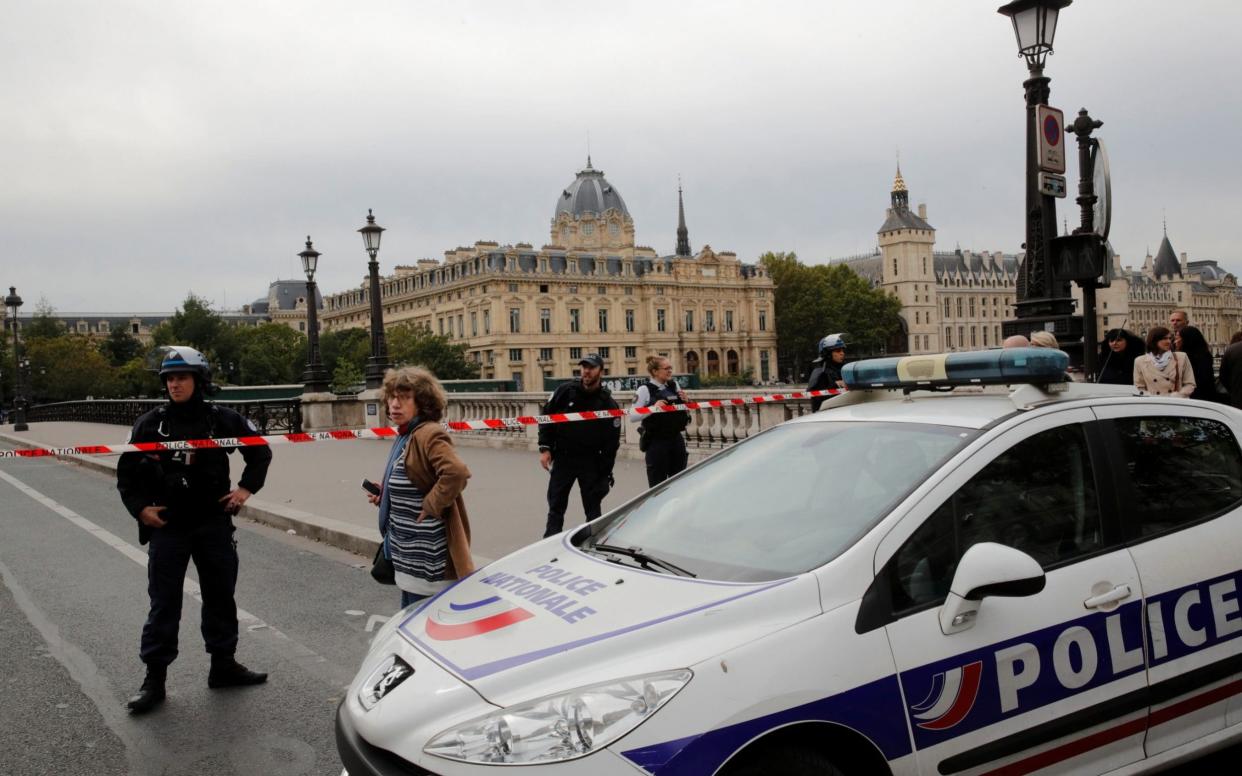 Three officers and an administrative assistant were stabbed to death in the attack - REUTERS