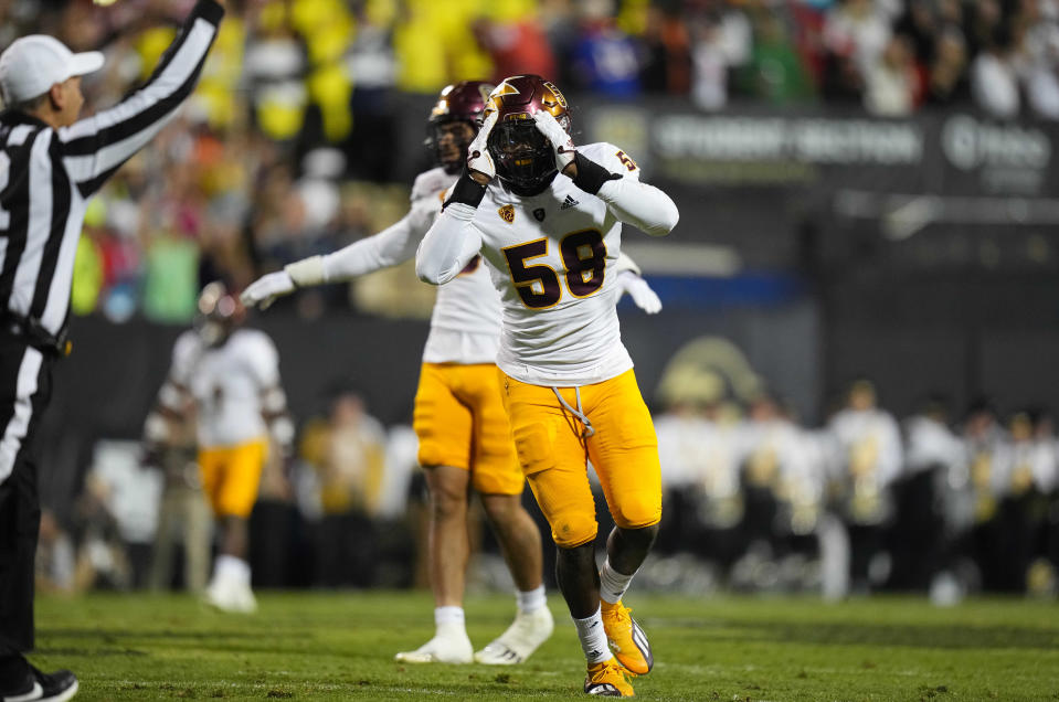 Oct 29, 2022; Boulder, Colorado, USA; Arizona State Sun Devils defensive lineman Joe Moore (58) celebrates after his sack against the Colorado Buffaloes in the second quarter at Folsom Field.