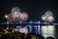 Fireworks light up the skies at the construction site of the Peljesac Bridge in Komarna, Croatia, Thursday, July 29, 2021. European Union-funded Peljesac Bridge in southern Croatia that has been built by a Chinese state-owned company was opened late Wednesday. The bridge was designed to connect two swaths of Adriatic Sea coastline and passes over a small stretch of Bosnia's territory. (AP Photo)