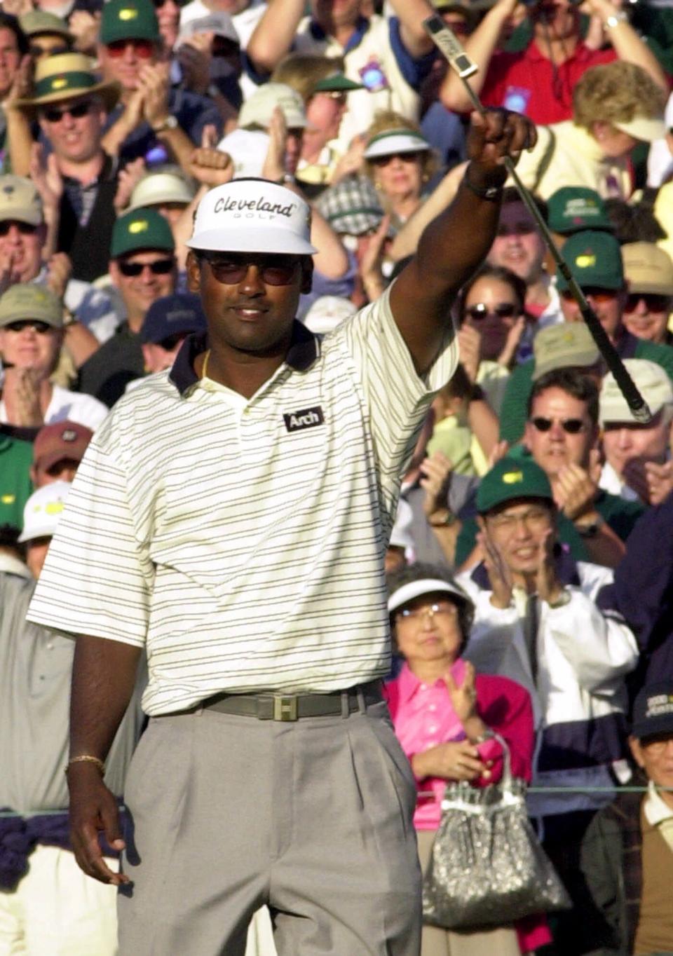 Vijay Singh, a Ponte Vedra Beach resident, raised his putter in triumph after closing out his victory in the 2000 Masters.