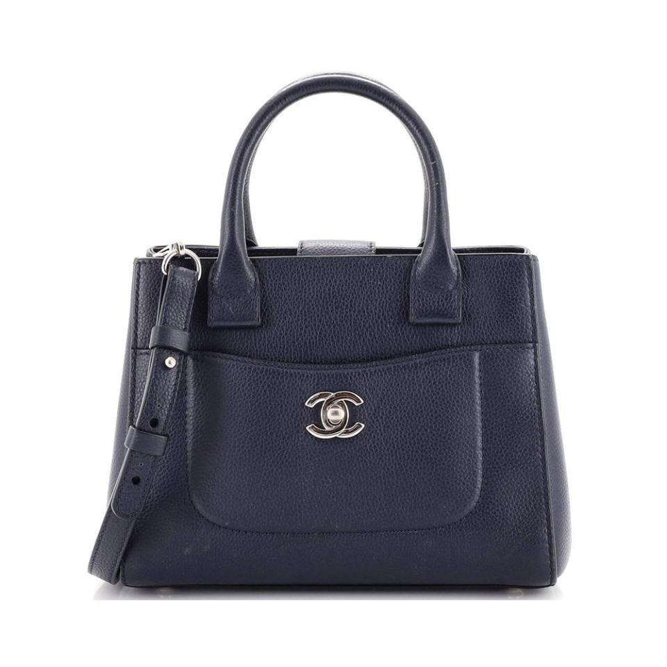 <p><a href="https://go.redirectingat.com?id=74968X1596630&url=https%3A%2F%2Fshop.rebag.com%2Fproducts%2Fhandbags-chanel-neo-executive-tote-grained-calfskin-mini2359193&sref=https%3A%2F%2F" rel="nofollow noopener" target="_blank" data-ylk="slk:Shop Now;elm:context_link;itc:0;sec:content-canvas" class="link ">Shop Now</a></p><p>Neo Executive Tote Grained Calfskin Mini</p><p>rebag.com</p><p>$2925.00</p>