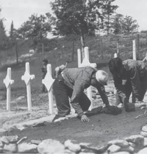 Children working in the Kenora Indian Residential School cemetery in 1941.