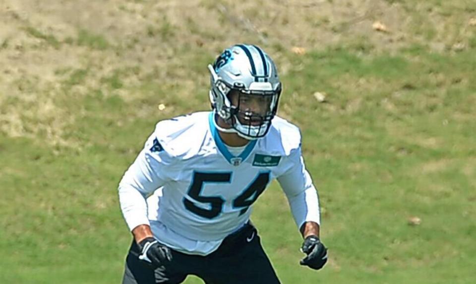 Carolina Panthers linebacker Kamu Grugier-Hill, right, runs through drills with his teammates during practice on Tuesday, April 25, 2023.