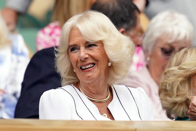 <p>Victoria Jones/PA Images via Getty Images</p> Queen Camilla in the royal box on day ten of the 2023 Wimbledon Championships at the All England Lawn Tennis and Croquet Club in Wimbledon.