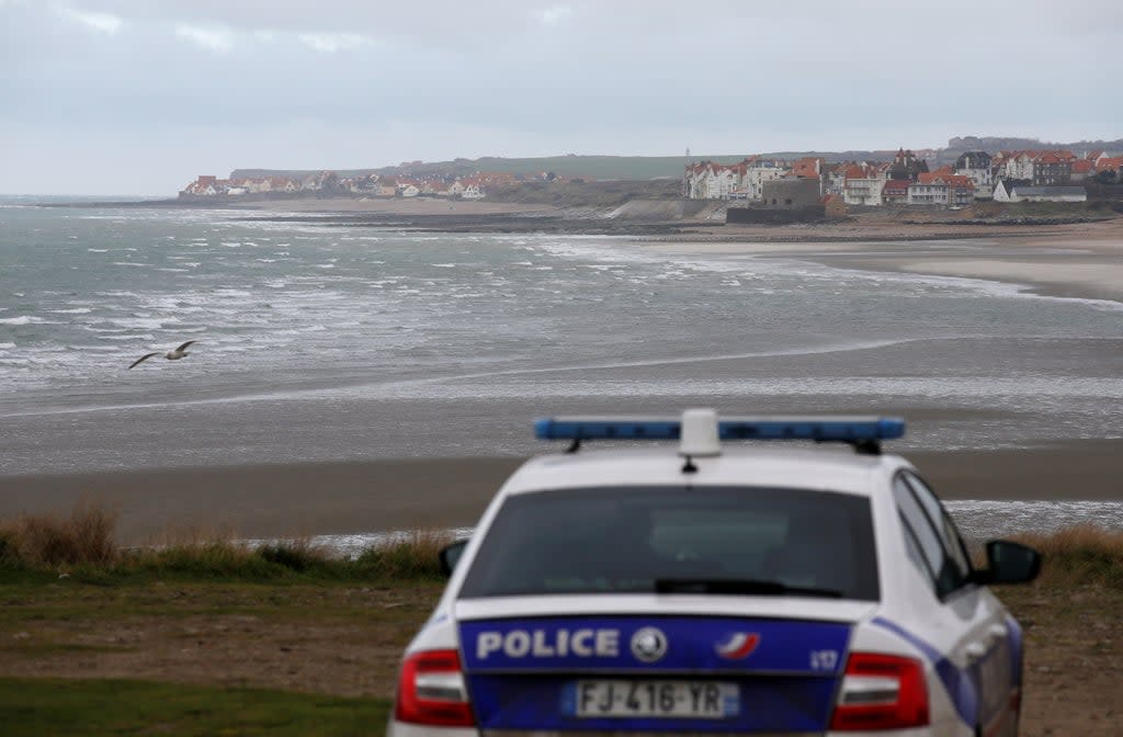French police patrol near the Slack dunes, the day after 27 migrants died when their dinghy deflated as they attempted to cross the English Channel, in Wimereux, near Calais (REUTERS)