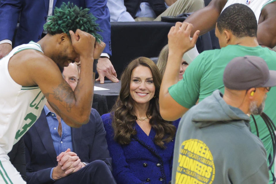Britain's Prince William, and Kate, Princess of Wales, attend an NBA basketball game between the Boston Celtics and the Miami Heat in Boston, Wednesday, Nov. 30, 2022. (Brian Snyder/Pool Photo via AP)