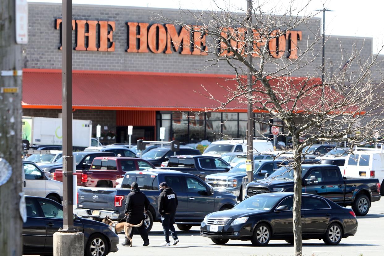 Security guards with a K-9 patrol The Home Depot parking lot in New Rochelle April 22, 2024.