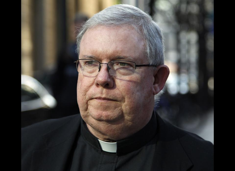 FILE - In a Tuesday, March 27, 2012 file photo, Monsignor William Lynn leaves the Criminal Justice Center, in Philadelphia. Lynn, accused of moving predator-priests to unwitting parishes, testified Wednesday, May 23, 2012 that he had no authority to make priest transfers. Lynn says he could only remove a priest who admitted abusing a minor. Lynn says he otherwise made recommendations for the cardinal. Lynn is testifying in the ninth week of his child-endangerment and conspiracy trial. (AP Photo/Alex Brandon, File)