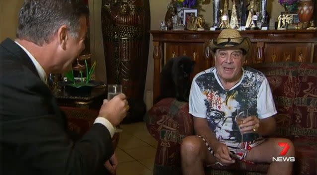 Mr Meldrum was certainly happy to be back at home - and he had more than one thing to toast. Photo: 7 News