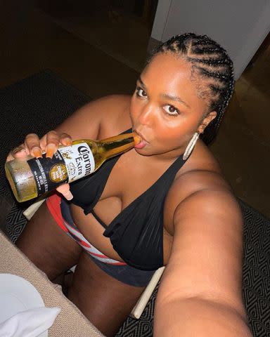 Lizzo Shares Sexy Beachside Bikini Pics, Calls Herself A 'Roll Model