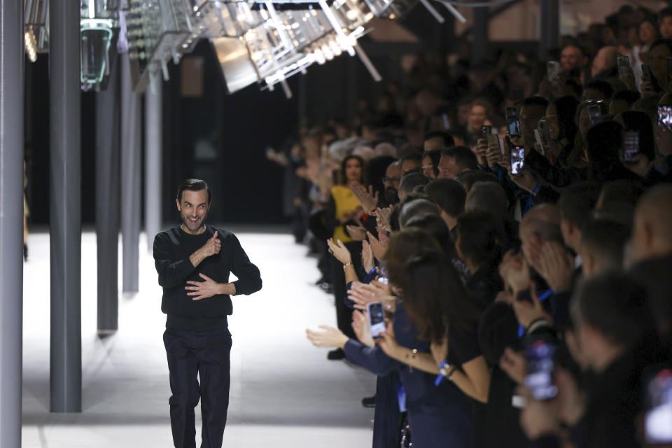 Nicolas Ghesquiere accepts applause after the Louis Vuitton Fall/Winter 2024-2025 ready-to-wear collection presented Tuesday, March 5, 2024 in Paris. (Photo by Vianney Le Caer/Invision/AP)
