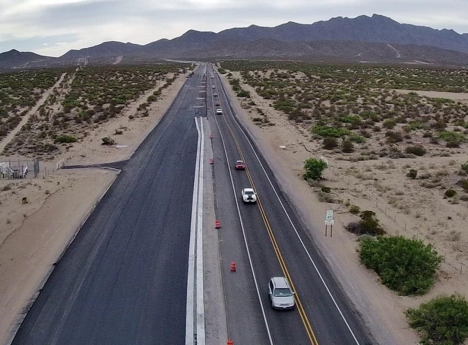Vehicles travel recently along New Mexico 404, also known as the Anthony Gap. A project to improve lighting and expand the roadway from two lanes to four lanes is two months ahead of schedule and about half way complete, according to a New Mexico Department of Transportation spokesperson.