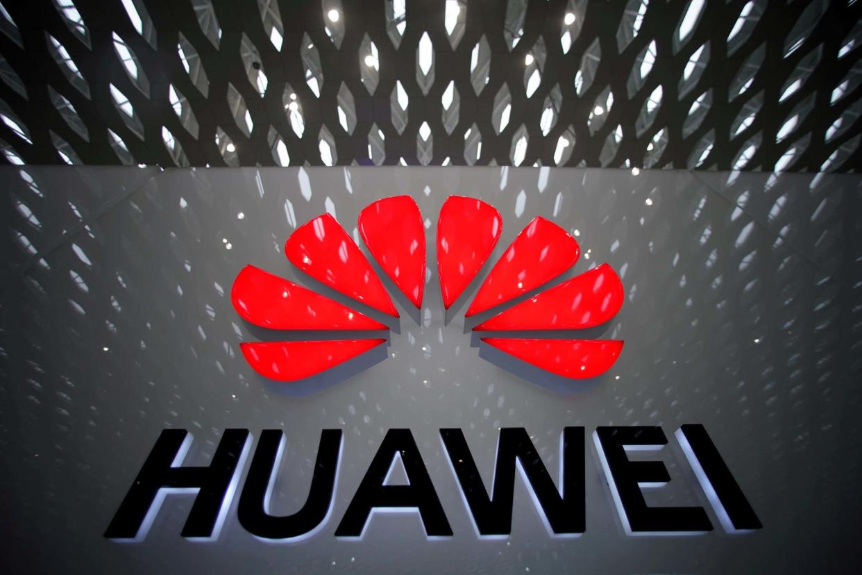 A Huawei company logo: REUTERS