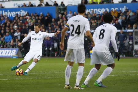 Football Soccer Britain - Swansea City v Crystal Palace - Premier League - Liberty Stadium - 26/11/16 Swansea City's Gylfi Sigurdsson scores their first goal Action Images via Reuters / Peter Cziborra Livepic