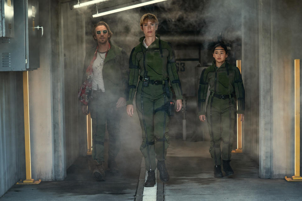 Dan Stevens as Trapper, Rebecca Hall as Dr. Ilene Andrews and Kaylee Hottlea as Jia in Godzilla vs. Kong: The New Empire