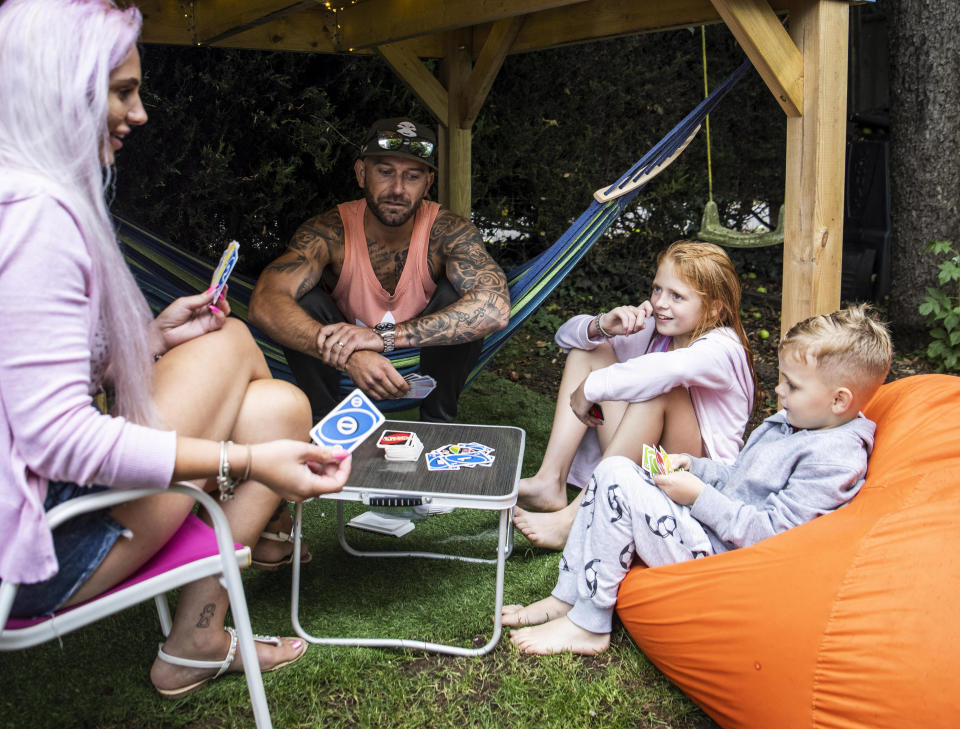 These pictures show a family of four who paid £500 to spent the night in a PLAYHOUSE - that was posted on Airbnb as a joke. Ollie and Kady Hammond had a 'mini break' on Saturday eve in the child's toy house - with their kids Beau, five, and Brooke, ten. They snapped up the booking after it was posted as a prank by Jason Kneen, 49. He built the 8ft (2.4m) by 6ft (1.8m) structure in his garden during lockdown. The dad-of-five then advertised it on the popular travel website for a laugh - but didn't actually think anyone would stump up to stay.