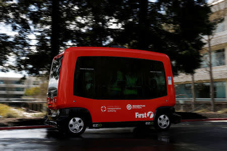 An EasyMile EZ10 shared autonomous vehicle carries passengers on a road at the Bishop Ranch business park during a deployment demonstration in San Ramon, California March 6, 2017. REUTERS/Stephen Lam