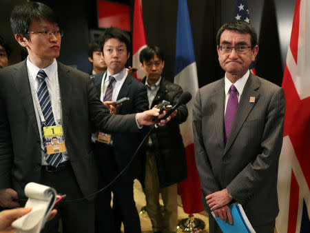 Japan's Minister of Foreign Affairs Taro Kono stops to speak to the media on the second day of Foreign ministers from G7 countries meetings in Toronto, Ontario, Canada April 23, 2018. REUTERS/Fred Thornhill