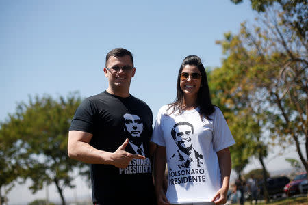 Rodrigo Portela and Roberta Portela, supporters of Presidential candidate Jair Bolsonaro attend a rally in Taguatinga near Brasilia, Brazil September 5, 2018. REUTERS/Adriano Machado