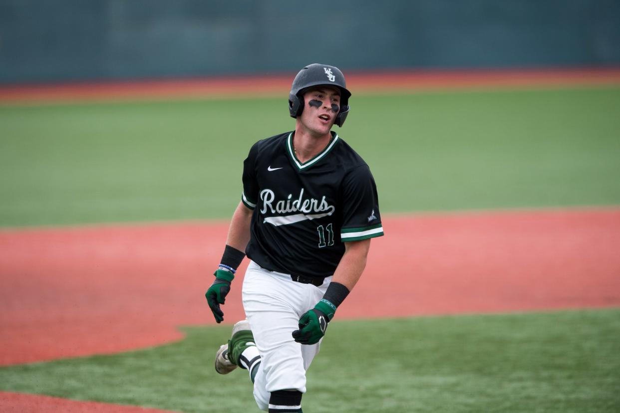 Wright State catcher Sammy Sass, a 2019 graduate of Upper Arlington, heads toward home plate during a 24-0 win over Oakland in the Horizon League championship game May 28. Sass tied a tournament record with nine RBI in the game.