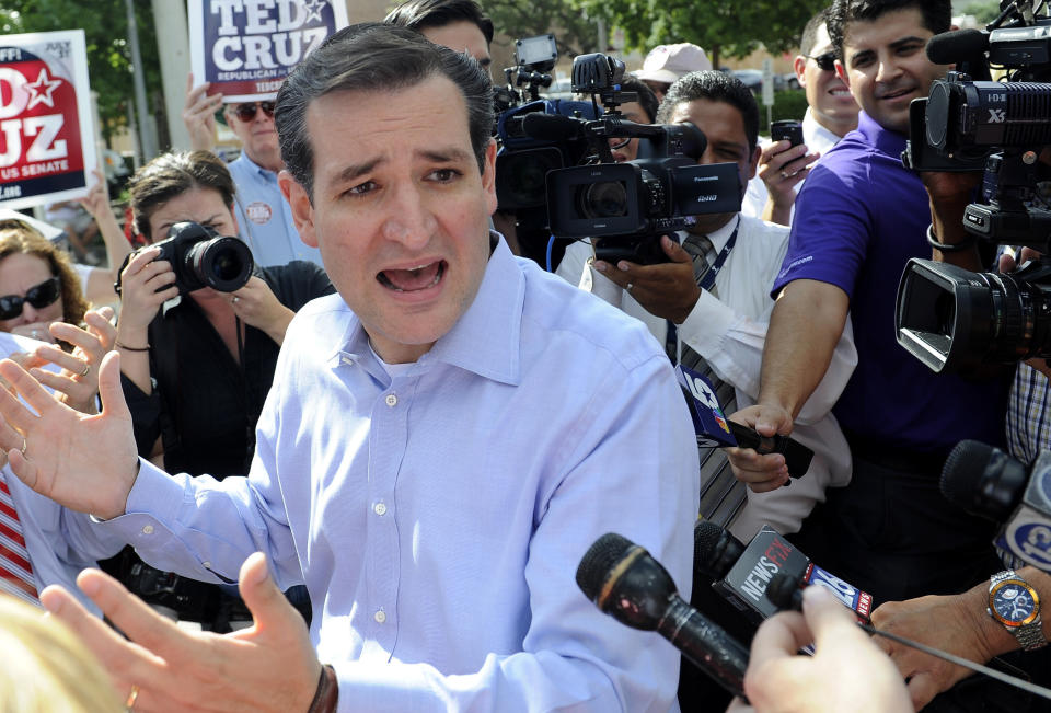 Sen. Ted Cruz (R-Texas) answers questions from the media at a voting precinct Tuesday, July 31, 2012, in Houston. Cruz faces Lt. Gov. David Dewhurst in the Republican primary runoff election for the Republican nomination for the U.S. Senate. (AP Photo/Pat Sullivan)