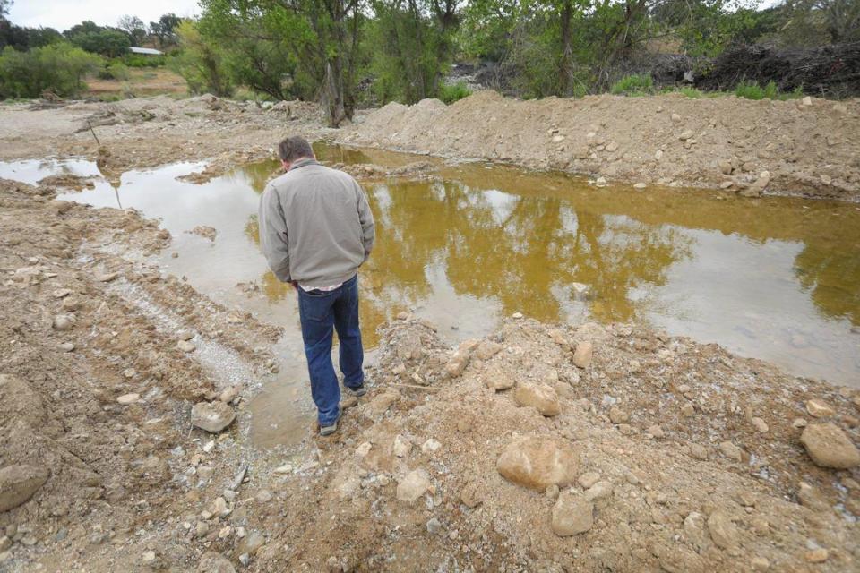 On May 9, 2023, four months after his son disappeared, Brian Doan stands near a spot along San Marcos Creek where search dogs alerted earlier this year. He would like to resume the search for Kyle, who was swept away in floodwaters on Jan. 9, 2023, and is requesting help from the San Luis Obispo County Sheriff’s Office.