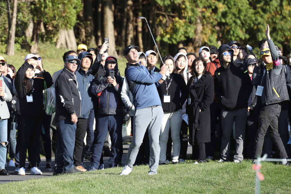 Brooks Koepka of the United States watches his shot on the 10th hole during the first round of the CJ Cup PGA golf tournament at Nine Bridges on Jeju Island, South Korea, Thursday, Oct. 18, 2018. (Park Ji-ho/Yonhap via AP)