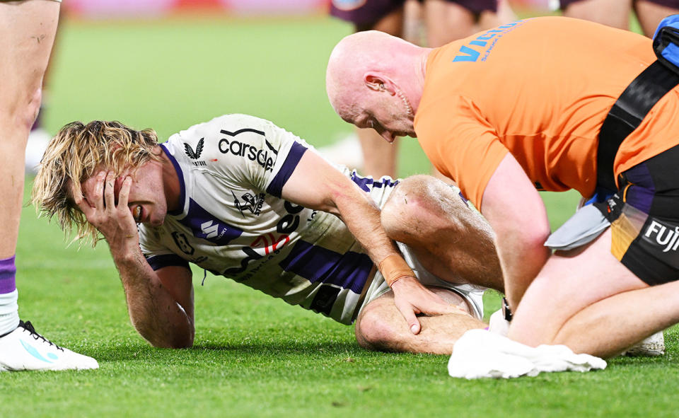Ryan Papenhuyzen broke his ankle in just his third NRL game back from a knee injury. (Photo by Bradley Kanaris/Getty Images)
