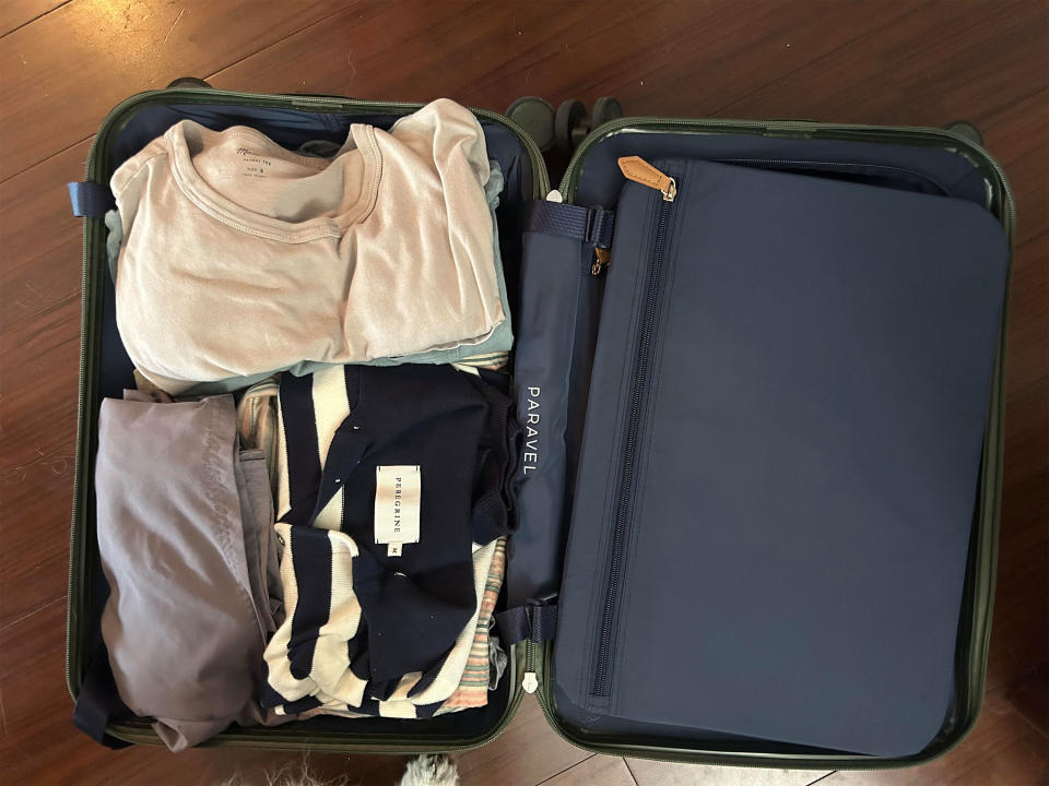 The Aviator Carry-On can easily fit several shirts, dresses and more. Scroll down to see a full list of what I packed.