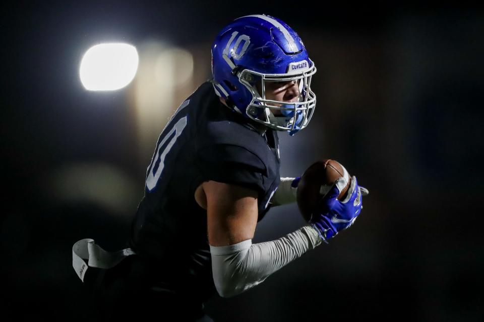 Covington Catholic tight end Willie Rodriguez (10) catches a pass against Johnson Central in the second half at Covington Catholic High School on Nov. 17.
