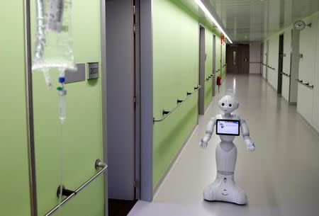 New recruit "Pepper" the robot, a humanoid robot designed to welcome and take care of visitors and patients, is seen at AZ Damiaan hospital in Ostend, Belgium June 16, 2016. REUTERS/Francois Lenoir