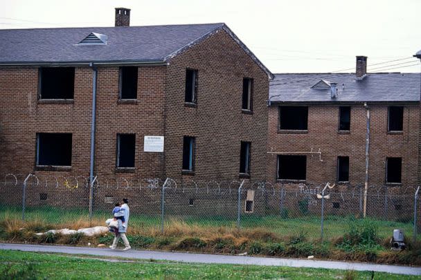 PHOTO: The deserted Desire Public Housing Project in a poor section of New Orleans is surrounded by a barbed wire fence. (Shepard Sherbell/Corbis via Getty Images)