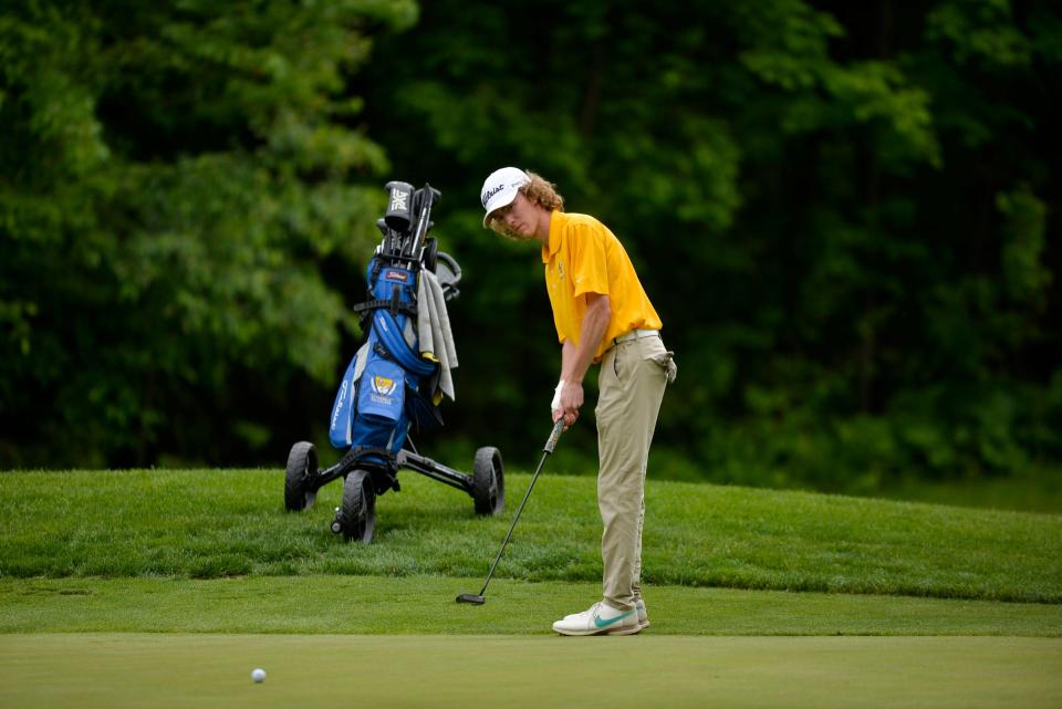 Cathedral's Leo Werschay putts on the 18th hole as Albany and Cathedral boys and girls golf compete in the Section 6-2A tournament on Tuesday, June 7, 2022, at Blackberry Ridge Golf Course in Sartell. 