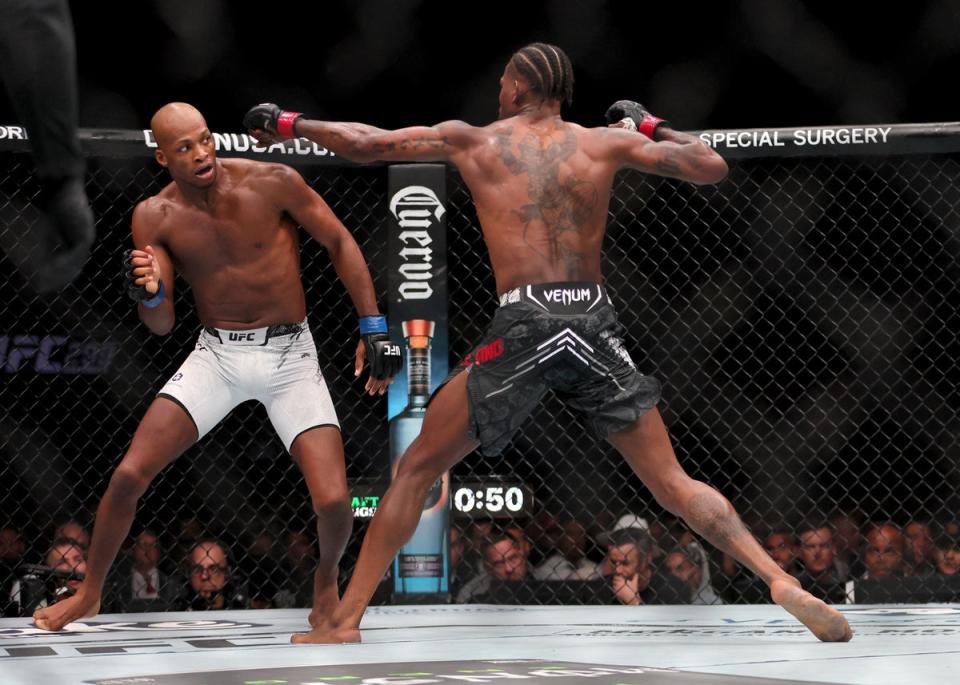 Michael Page (left) was too slick for Kevin Holland in March (USA TODAY Sports via Reuters Con)