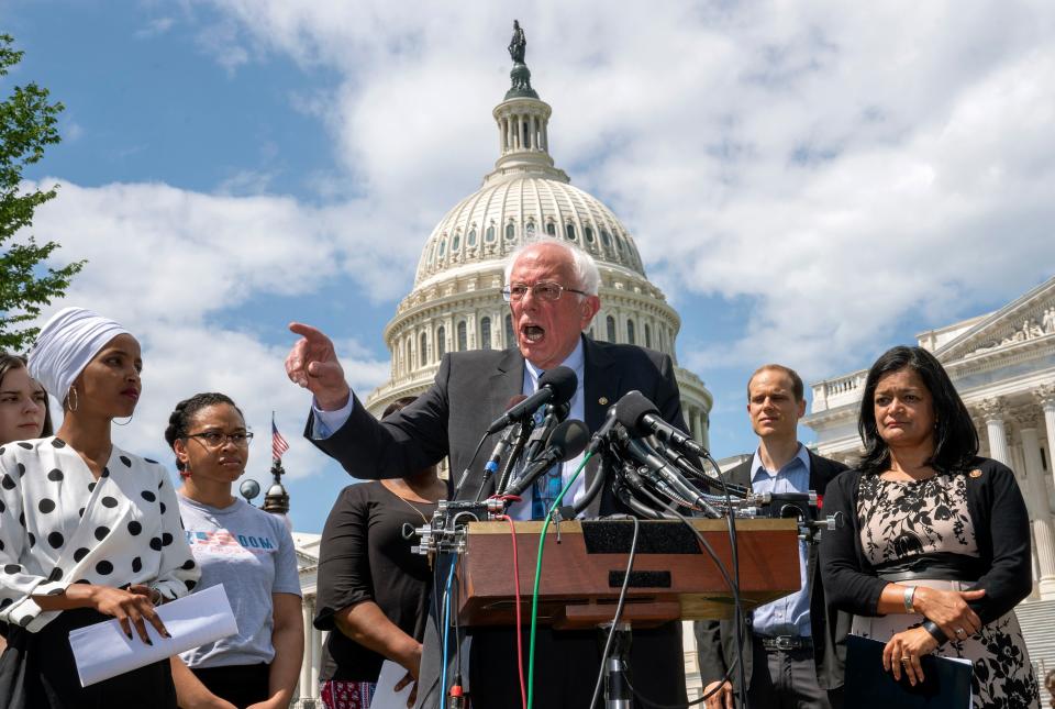 Democratic presidential candidate Bernie Sanders, flanked Monday by Rep. Ilhan Omar (D-Minn.), left, and Rep. Pramila Jayapal (D-Wash.) calls for legislation to cancel all student debt in a speech at the Capitol in Washington, D.C. (Photo: J. Scott Applewhite/ASSOCIATED PRESS)