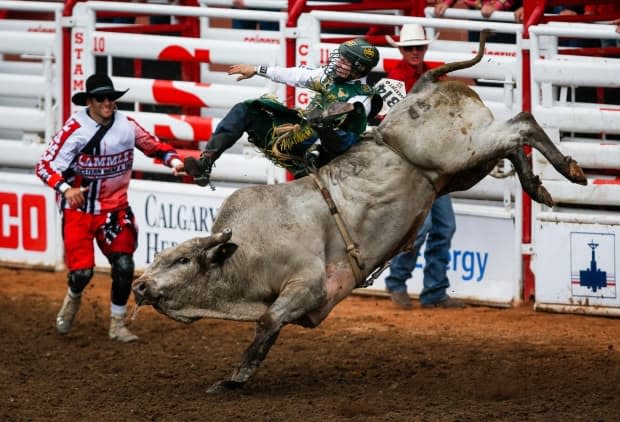 The Calgary Stampede says all rodeo participants will face a variety of restrictions, including not mixing with the general public.  (Jeff Mcintosh/The Canadian Press - image credit)