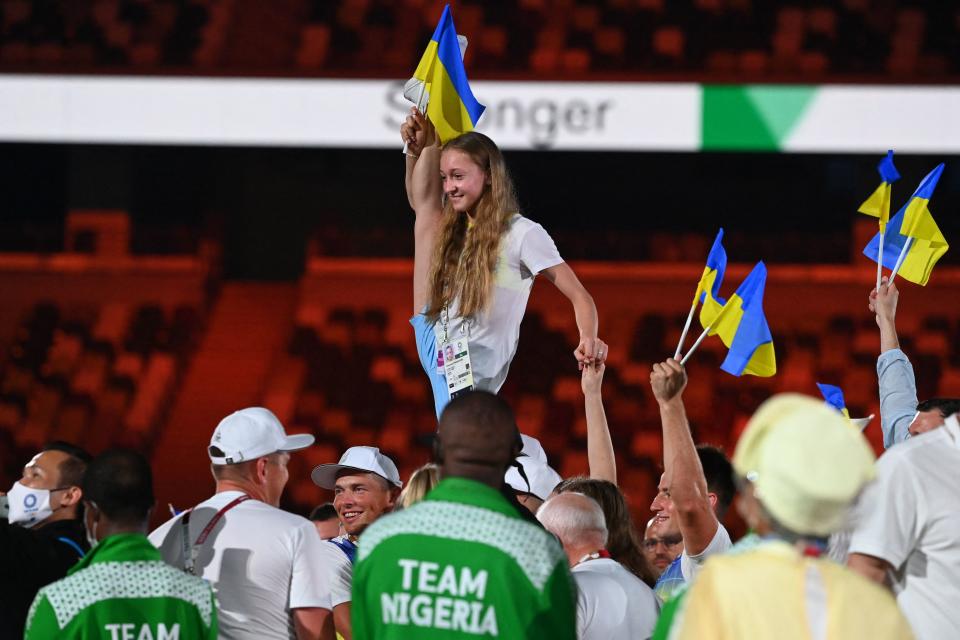 Ukraine's athletes gather on the field during the closing ceremony of the Tokyo 2020 Olympic Games, at the Olympic Stadium, in Tokyo, on August 8, 2021. (Photo by Adek BERRY / AFP) (Photo by ADEK BERRY/AFP via Getty Images)